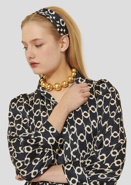 Robe Rivoltina bleu nuit à fleurs écrues